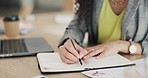 Woman, hands and writing in book by laptop for planning, schedule or tasks for business strategy at office desk. Hand of female employee taking notes by computer for project plan, idea or reminder