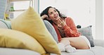 Woman, loudspeaker and phone call in home for talking, voice conversation and smile in living room. Happy female, communication and mobile microphone for audio chat, connection and digital recording