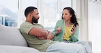 Argue, smartphone and couple on sofa, anger and shouting in living room, disagreement and cheating. Partners, man and woman on sofa, screaming and cellphone with text messages and affair in lounge