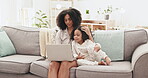 Relax, laptop and mother with daughter on sofa for steaming, cartoon and movies. Bonding, affectionate and weekend with woman and girl in living room at home for search, website and internet