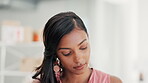 Focus, idea and businesswoman reading in an office at work working and planning for a startup company. Serious, head and professional female employee, worker or entrepreneur inspired by strategy