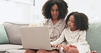 Search, laptop and mother with daughter on sofa for steaming, cartoon and movies. Bonding, affectionate and weekend with woman and girl in living room at home for search, website and internet