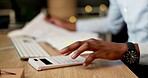 Businessman, hands and calculator at night for accounting, financial audit or budget planning at office desk. Hand of man accountant working late calculating business finance, investment or expenses