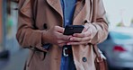 Closeup, hands and woman with smartphone, city and connection with texting, social media or chatting. Zoom, female or lady with cellphone, mobile app notification or walking in town or search website