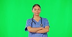 Healthcare, confidence and woman doctor on green screen with mockup space and chromakey background. Medicine, nurse or medical professional in studio with arms crossed, mock up and motivation to help