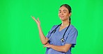 Healthcare, green screen and woman doctor presenting advice, information or health care announcement. Help, medicine and female medical professional presentation of hospital info on studio chromakey.