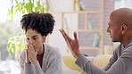 Couple, divorce and disagreement or argument on sofa in living room dispute or unhappy relationship at home. Frustrated or upset woman and man talking in breakup, cheating or affair in conflict fight