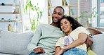 Relax, sofa and couple watching tv in home, bonding and enjoying time together. Interracial, television and happy black man and woman watch movie, video or streaming on couch, cuddle and talking.