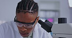 Microscope, pharmacy and science with black man in laboratory for research, virus and breakthrough. Development, medical and healthcare with male and check for experiment, medicine and analysis