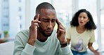 Couple, divorce and ignore with headache in home, fight or argument on sofa. Interracial, cheating and stress, migraine and depressed black man and woman with conflict, angry or marriage problem.