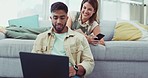 Phone, laptop and couple relax in a living room while online for property, home loan or mortgage discussion. Internet, search and man with woman browsing real estate, rental or apartment listing