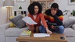 Stress, frustrated and couple on couch, documents and financial crisis with discussion in living room. Partners, black man and woman on sofa, paperwork and debt with finance issue and money problems 