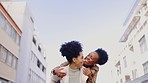 Girl friends, city and laughing of young people outdoor doing a fun piggyback. Urban travel, freedom and happiness of women with a smile from youth and vacation together while on a summer holiday