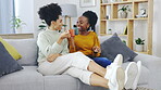 Happy, coffee and friends with women on sofa in living room for bonding, support and relax. Communication, chatting and self care with female at home for sharing, positive and happiness on break 
