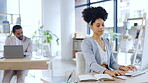 Typing, serious and computer with woman in office for research, planning and concentration. Professional, technology and proposal with female working at desk for idea, communication and email