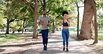 Fitness, running and black couple in park for exercise, cardio and bonding in nature together. Marathon training, man and woman run on garden path for health, wellness and workout with green trees.