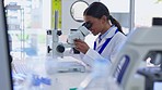 Medical, microscope research and woman scientist for dna data and laboratory work for science study. Lab worker, analytics and biotechnology test of a clinic employee working on health results