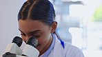 Science, research and woman scientist with a microscope in a lab for healthcare innovation. Biotechnology, analysis and Indian female scientific researcher working on a project in medical laboratory.