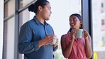 Creative business people, talking and coffee break for communication or team socializing at the office. Happy man and woman employees discussing social life or startup with hot drink at the workplace