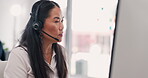 Asian woman, call center and consulting on computer in disagreement, customer service or support at office. Female consultant agent talking to difficult client in telemarketing business on desktop PC