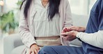 Holding hands, consulting or woman speaking to nurse about health problems in consultation for support. Closeup, empathy or healthcare patient talking or explaining to doctor for helping advice 