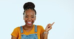 Excited face, smile and black woman point at commercial promotion, advertising copy space or marketing mockup. Announcement, product placement portrait and studio female isolated on pastel background