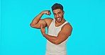 Fitness, green screen and man flexing muscle on mockup space for information or tips on body growth in studio. Mock up, exercise and healthy motivation by Indian personal trainer or sports instructor