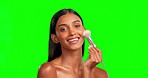 Woman, makeup and face brush on green screen, studio and skincare foundation, blush or contour. Happy female model, portrait and brushing facial powder, beauty cosmetics and smile on color background