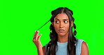Attitude, chewing gum and a woman on a green screen background in studio playing with her hair. Portrait, rebel and edgy with an attractive young female feeling moody alone on chromakey mockup