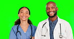 Medical, smile and nurse with doctor in green screen studio for healthcare, support and  pride. Medicine, happy and trust with portrait of black man and woman on background for wellness and clinic