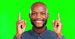 Green screen face, studio and happy man pointing up at commercial promotion, advertising space or brand mockup. Marketing portrait, product placement and African chroma key male on mock up background