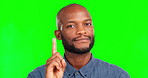 Portrait, hand gesture and no with a black man on a green screen background in studio waving his finger. Face, negative and disagreement with a handsome young african american male on chromakey