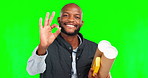 Black man, architect and green screen, okay hand sign with smile and blueprint, construction with ok on studio background. Mockup, architecture and portrait with happy male contractor and agreement