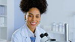 Woman, face and smile in forensic science with microscope for discovery or breakthrough at laboratory. Portrait of happy female scientist smiling for healthcare or scientific research in biology lab