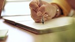 Woman, hand and pen writing in a notebook at home working on study schedule and learning plan. Book, notes and house desk with a female student and creative writer busy with studying with a journal