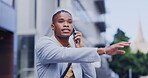 Black man, phone call and city waiting for transport on sidewalk signaling driver in business travel or trip. African businessman talking on smartphone with hand signal calling taxi in an urban town