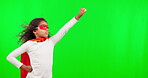 Green screen, superhero and child doing flying gesture in costume with mockup space isolated in a studio background. Advertising, mask and young kid with wind blowing in cosplay outfit to stop crime
