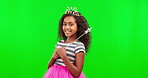 Kids, wand and a girl on a green screen background in studio as a fairy princess with a crown or tiara. Children, magic or fantasy with a happy and adorable little female child on chromakey mockup