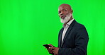 Black man, phone and thinking in communication on green screen for thought or wonder against studio background. Thoughtful African American businessman typing on smartphone contemplating on mockup