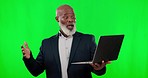 Surprise, green screen and black man with laptop, achievement and target against a studio background. African American male employee, manager and leader with device, technology and network with shock