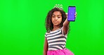 Phone, face and princess with green screen and magic wand in studio isolated on a background mockup. Portrait, girl and kid with cellphone for advertising or product placement with tracking markers.