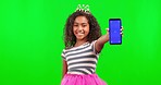 Phone, face and princess with green screen and magic wand in studio isolated on a background mockup. Portrait, girl and happy kid with cellphone for advertising or marketing with tracking markers.