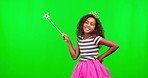 Child at costume party with wand, crown and green screen and magic princess dress up in studio. Fantasy, play and smile, girl with tiara and happiness in fun mockup space, birthday games for children