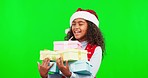 Green screen, Christmas and girl with presents, excited and happiness against studio background. Female child, young person or kid with Xmas gifts, boxes or joyful with parcels, package or excitement