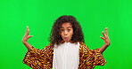 Mind blown, reaction and portrait of surprised child feeling amazed, shocked and isolated in a green screen studio background. Excited, wow and young kid in costume doing OMG hand gesture