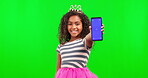 Phone screen, mockup and wand with child in green screen studio for magic, good news and online deal. Happy, princess costume and chroma key with girl for social media, website and technology