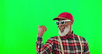 Funky, green screen and a senior black man pointing to mockup space with a hand gesture in studio. Fashion, style and a marketing with an excited mature male on chromakey for product placement