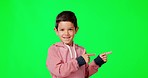 Happy, face and pointing boy on a green screen isolated on a studio background. Smile, young and portrait of a child showing a chromakey mockup space for advertising with a gesture on a backdrop