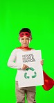 Child superhero, pointing and green screen in studio with poster for recycling, accountability and face in mockup. Kid, boy and protest for hey you, anger or future of earth for ecology by background