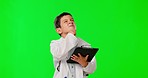 Thinking, tablet and a child doctor on a green screen isolated on a studio background. Planning, browsing and a boy pretending to be a healthcare professional with tech for internet with mockup